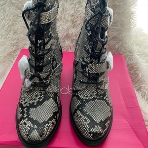 Women’s snakeskin combat boots
